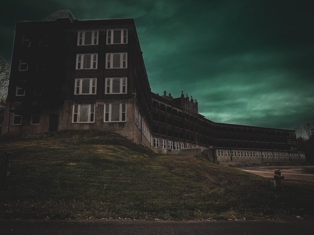 Notoriously haunted Waverly Hills Sanatorium looms under storm clouds
