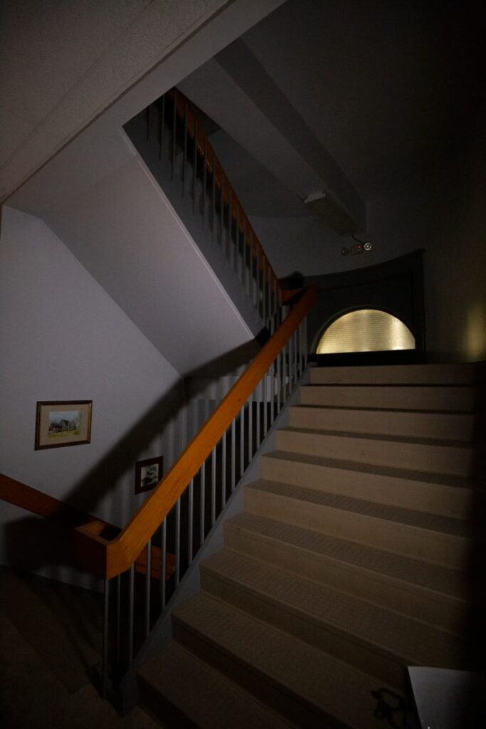 The stairs up to the locked and untouched theater in Janesville Senior Center where a young ghostly woman in white is encountered