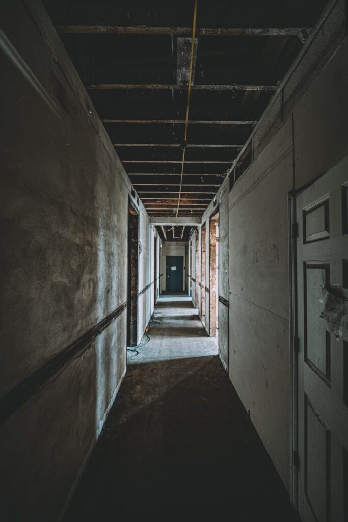 Long hallways on the haunted top floor make it an unnerving wait for paranormal activity