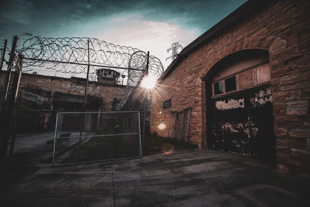 High fences and barbed wire keep the spirits of Old Joliet Prison in place