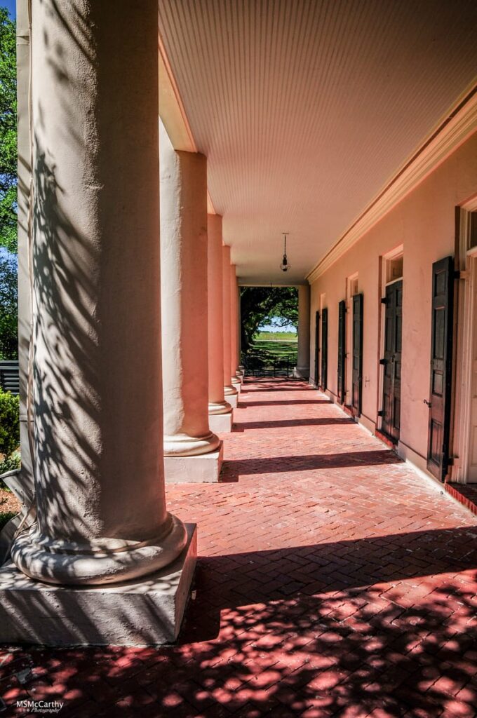 A woman in black is said to roam the building and grounds of Oak Alley Plantation