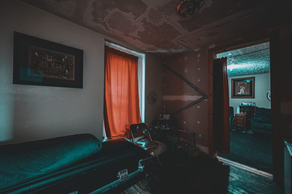 The former birthing suite of the Old Stimson Hospital now hosts a coffin and cursed doll