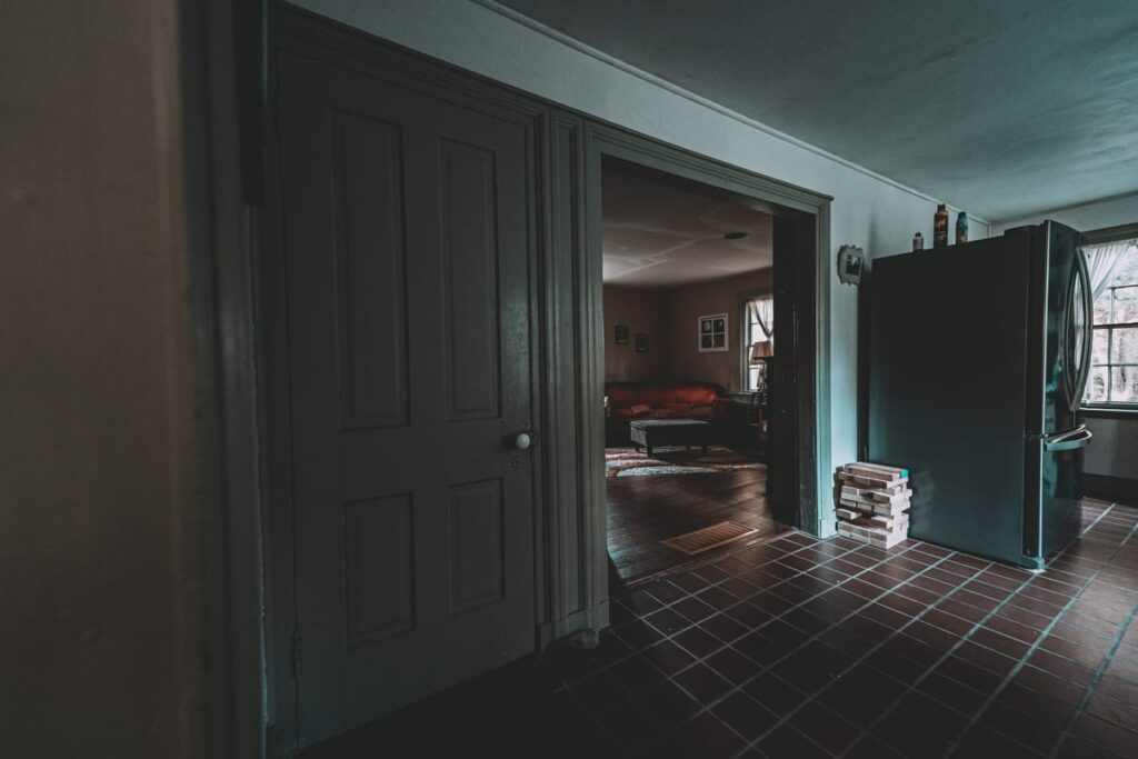 Since the early 1970s, the owners of the house have experienced a basement door that would not remain closed. Some say caused by spirits