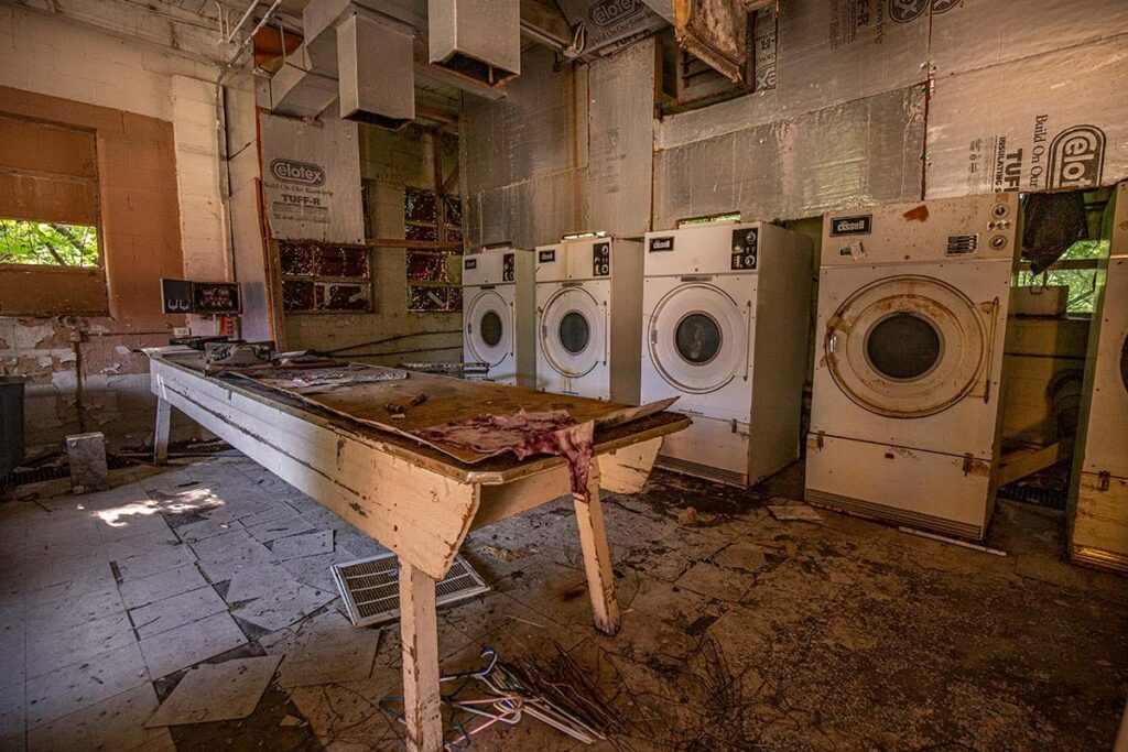 even during it's operation, there were rumors of an elder woman's ghost wandering the laundry rooms